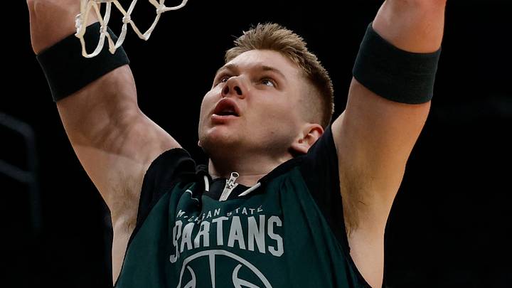 Mar 26, 2026; Washington, DC, USA; Michigan State Spartans forward Jaxon Kohler (0) dunks during a practice session ahead of the east regional of the men's 2026 NCAA Tournament at Capital One Arena. Mandatory Credit: Geoff Burke-Imagn Images