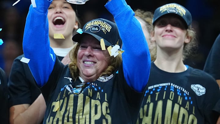 Apr 5, 2026; Phoenix, AZ, USA; UCLA Bruins head coach Cori Close celebrates on the podium after defeating the South Carolina Gamecocks during the National Championship game of the women's 2026 NCAA Tournament at Mortgage Matchup Center. Mandatory Credit: Kirby Lee-Imagn Images