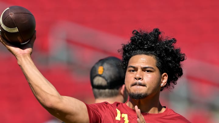Sep 6, 2025; Los Angeles, California, USA;  USC Trojans quarterback Jayden Maiava (14) warms up prior to the game against the Georgia Southern Eagles at United Airlines Field at Los Angeles Memorial Coliseum. Mandatory Credit: Jayne Kamin-Oncea-Imagn Images