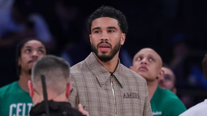 Oct 24, 2025; New York, New York, USA;  Boston Celtics guard Jayson Tatum, center, looks on during the fourth quarter against the New York Knicks at Madison Square Garden. Mandatory Credit: Vincent Carchietta-Imagn Images