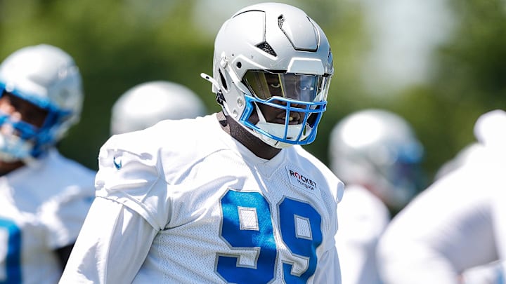 Detroit Lions defensive tackle Brodric Martin (99) practices during OTAs at Detroit Lions practice facility 