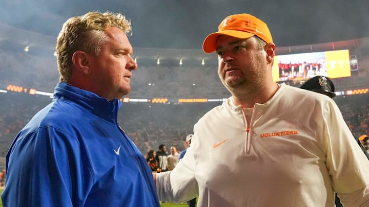 Tennessee head coach Josh Heupel and Kentucky offensive line coach Eric Wolford talk after a NCAA football game between Tennessee and Kentucky in Neyland Stadium on Saturday, Nov. 2, 2024.