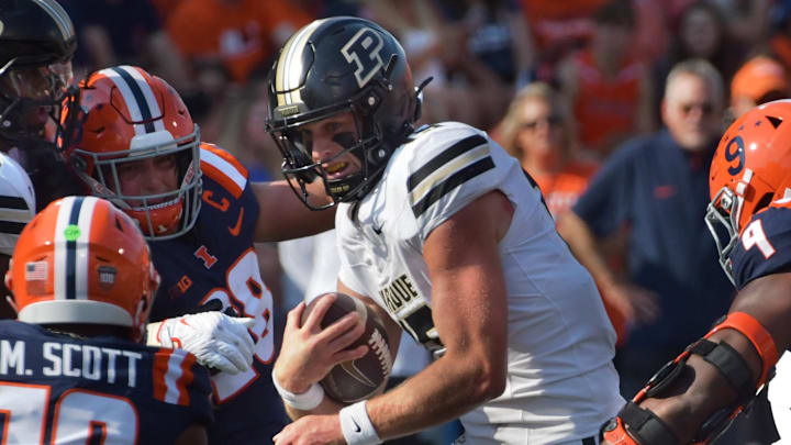 Purdue Boilermakers quarterback Ryan Browne (15) runs with the ball 