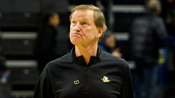 Oregon head coach Dana Altman looks toward the scoreboard as he walks off the court as the Oregon Ducks host the Minnesota Golden Gophers on Feb. 17, 2026, at Matthew Knight Arena in Eugene, Oregon.