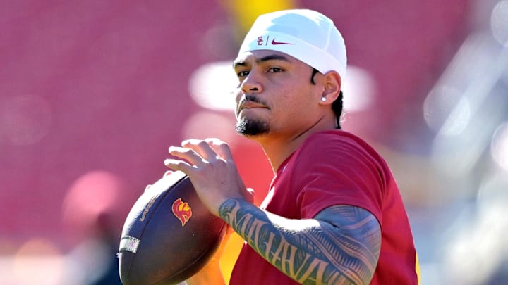 Oct 11, 2025; Los Angeles, California, USA;  USC Trojans quarterback Jayden Maiava (14) warms up prior to the game against the Michigan Wolverines at United Airlines Field at the Los Angeles Memorial Coliseum. Mandatory Credit: Jayne Kamin-Oncea-Imagn Images