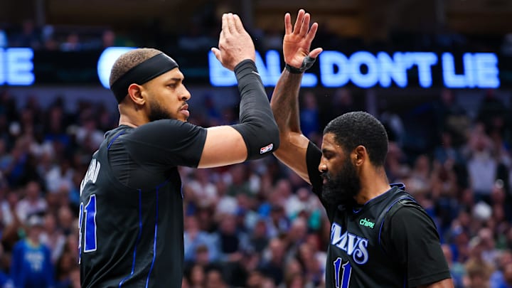 Feb 22, 2024; Dallas, Texas, USA; Dallas Mavericks guard Kyrie Irving (11) celebrates with Dallas Mavericks center Daniel Gafford (21) during the second half against the Phoenix Suns at American Airlines Center. Mandatory Credit: Kevin Jairaj-Imagn Images Feb 22, 2024; Dallas, Texas, USA; Dallas Mavericks guard Kyrie Irving (11) celebrates with Dallas Mavericks center Daniel Gafford (21) during the second half against the Phoenix Suns at American Airlines Center. Mandatory Credit: Kevin Jairaj-Imagn Images
