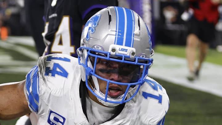 Sep 22, 2025; Baltimore, Maryland, USA; Detroit Lions wide receiver Amon-Ra St. Brown (14) makes a touchdown catch against Baltimore Ravens cornerback Marlon Humphrey (44) during the second half at M&T Bank Stadium. Mandatory Credit: Peter Casey-Imagn Images Sep 22, 2025; Baltimore, Maryland, USA; Detroit Lions wide receiver Amon-Ra St. Brown (14) makes a touchdown catch against Baltimore Ravens cornerback Marlon Humphrey (44) during the second half at M&T Bank Stadium. Mandatory Credit: Peter Casey-Imagn Images