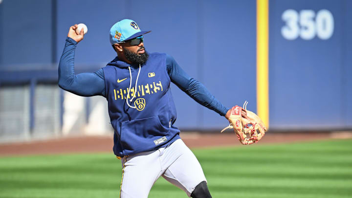 Milwaukee Brewers infielder Luis Rengifo (13) throws to second base during spring training workouts Tuesday, February 17, 2026, at American Family Fields of Phoenix in Phoenix, Arizona.