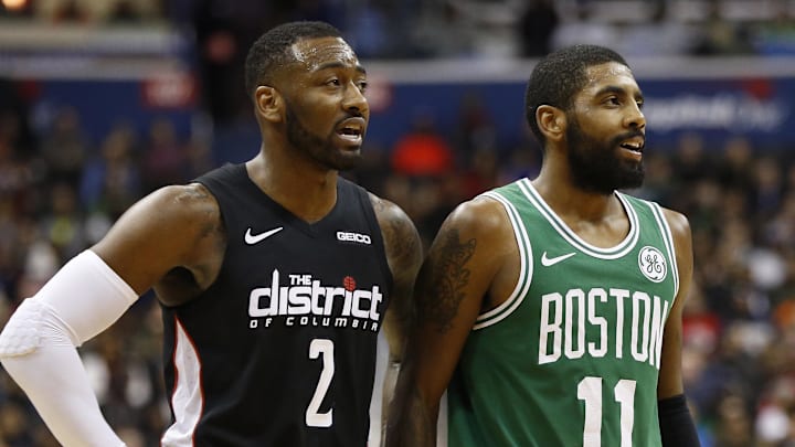 Dec 12, 2018; Washington, DC, USA; Washington Wizards guard John Wall (2) talks with Boston Celtics guard Kyrie Irving (11) in the fourth quarter at Capital One Arena. The Celtics won 130-125 in overtime. Mandatory Credit: Geoff Burke-Imagn Images Dec 12, 2018; Washington, DC, USA; Washington Wizards guard John Wall (2) talks with Boston Celtics guard Kyrie Irving (11) in the fourth quarter at Capital One Arena. The Celtics won 130-125 in overtime. Mandatory Credit: Geoff Burke-Imagn Images