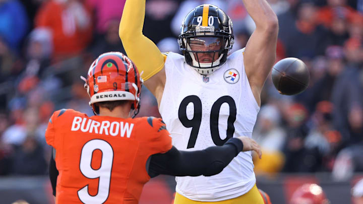 Dec 1, 2024; Cincinnati, Ohio, USA;  Pittsburgh Steelers linebacker T.J. Watt (90) attempts to block the pass from Cincinnati Bengals quarterback Joe Burrow (9) during the first quarter at Paycor Stadium. Mandatory Credit: Joseph Maiorana-Imagn Images