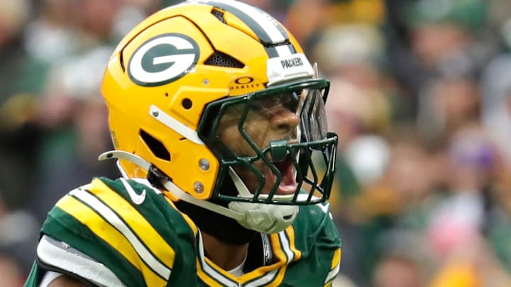 Green Bay Packers defensive end Micah Parsons (1) celebrates sacking Minnesota Vikings quarterback J.J. McCarthy.