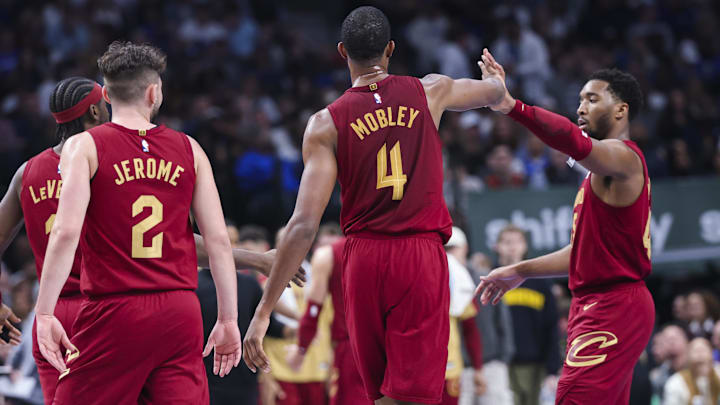 Jan 3, 2025; Dallas, Texas, USA; Cleveland Cavaliers forward Evan Mobley (4) celebrates with Cleveland Cavaliers guard Donovan Mitchell (45) during the first half against the Dallas Mavericks at American Airlines Center. Mandatory Credit: Kevin Jairaj-Imagn Images Jan 3, 2025; Dallas, Texas, USA; Cleveland Cavaliers forward Evan Mobley (4) celebrates with Cleveland Cavaliers guard Donovan Mitchell (45) during the first half against the Dallas Mavericks at American Airlines Center. Mandatory Credit: Kevin Jairaj-Imagn Images