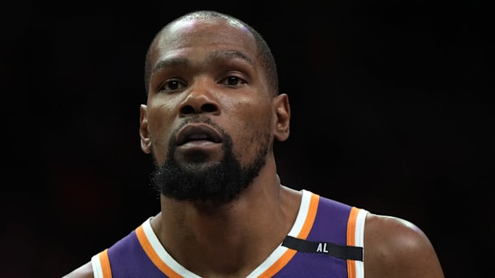 Mar 26, 2025; Phoenix, Arizona, USA; Phoenix Suns forward Kevin Durant (35) looks on against the Boston Celtics during the second half at Footprint Center.