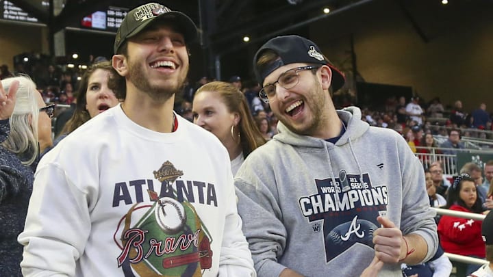 Atlanta Braves fans react before the game on Opening Day against the Cincinnati Reds at Truist Park.