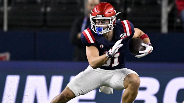 Jan 30, 2025; Arlington, TX, USA; East wide receiver Efton Chism of Eastern Washington (81) runs with the ball during the first half against the West at AT&T Stadium. Mandatory Credit: Jerome Miron-Imagn Images