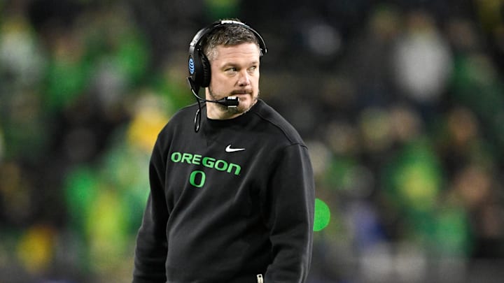 Dec 20, 2025; Eugene, OR, USA;  Oregon Ducks head coach Dan Lanning looks on during the fourth quarter against the James Madison Dukes at Autzen Stadium. Mandatory Credit: Craig Strobeck-Imagn Images