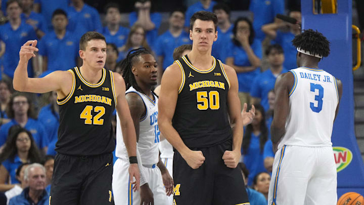 Jan 7, 2025; Los Angeles, California, USA; Michigan Wolverines center Vladislav Goldin (50) and forward Will Tschetter (42) react against the UCLA Bruins in the second half at Pauley Pavilion presented by Wescom.