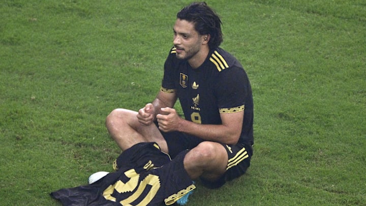 Mexico forward Raul Jimenez (9) celebrates with the jersey honoring Liverpool forward Diogo Jota after scoring a goal.