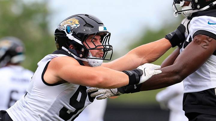 Jacksonville Jaguars defensive end Danny Striggow (92), left, drills on defensive end Quindarius Dunnigan (59) during the first day of minicamp at the Miller Electric Center, Tuesday, June 9, 2026, in Jacksonville, Fla.