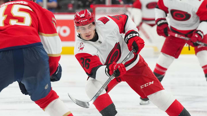 Sep 24, 2025; Raleigh, North Carolina, USA;  Carolina Hurricanes right wing Felix Unger Sorum (36) takes a shot against the Florida Panthers during the third period at Lenovo Center. Mandatory Credit: James Guillory-Imagn Images