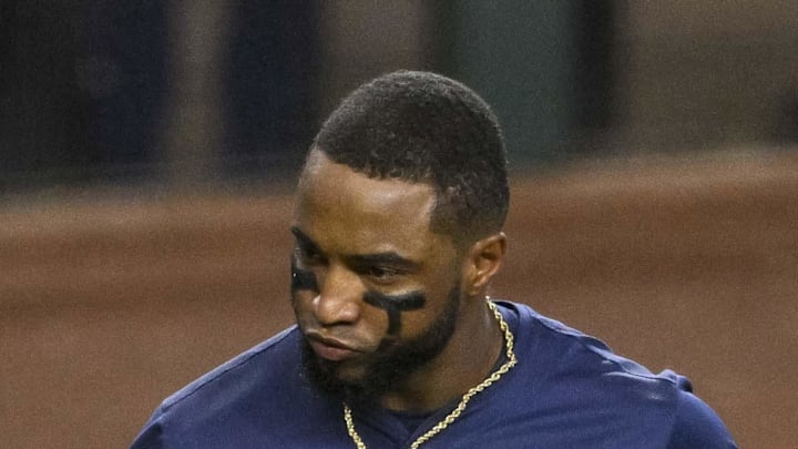 Seattle Mariners right fielder Victor Robles (10) scores against the Texas Rangers during the sixth inning at Globe Life Field on Sept. 22, 2024. Seattle Mariners right fielder Victor Robles (10) scores against the Texas Rangers during the sixth inning at Globe Life Field on Sept. 22, 2024.