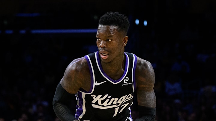 Oct 17, 2025; Los Angeles, California, USA; Sacramento Kings guard Dennis Schroder (17), right, drives the ball during the first half against the Los Angeles Lakers at Crypto.com Arena. Mandatory Credit: William Liang-Imagn Images