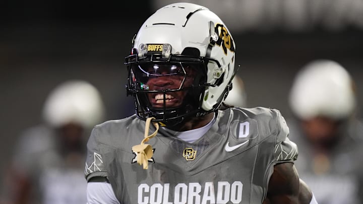 Oct 26, 2024; Boulder, Colorado, USA; Colorado Buffaloes wide receiver Travis Hunter (12) reacts after touchdown reception in the first quarter against the Cincinnati Bearcats at Folsom Field. Mandatory Credit: Ron Chenoy-Imagn Images