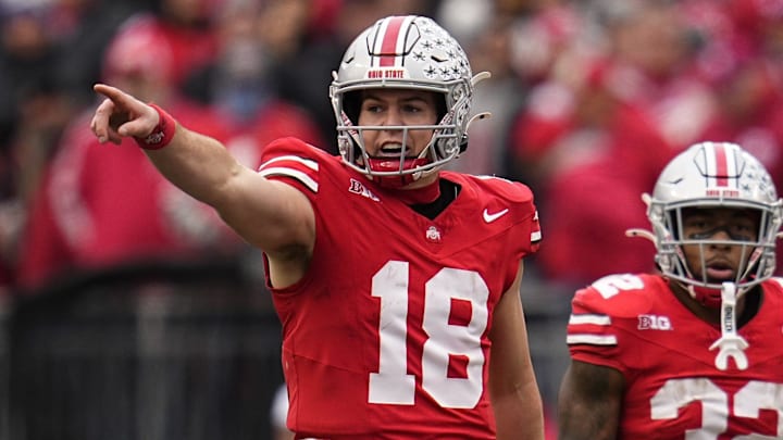 Ohio State Buckeyes quarterback Will Howard (18) signals to his offense during the second half of the NCAA football game against the Indiana Hoosiers at Ohio Stadium in Columbus on Saturday, Nov. 23, 2024. Ohio State won 38-15.