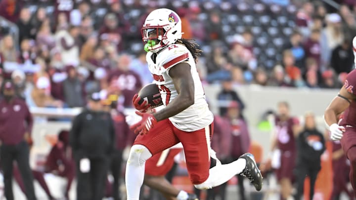 Nov 1, 2025; Blacksburg, Virginia, USA; Louisville Cardinals running back Keyjuan Brown (22) runs the ball for a touchdown against the Virginia Tech Hokies during the fourth quarter at Lane Stadium. Mandatory Credit: Brian Bishop-Imagn Images Nov 1, 2025; Blacksburg, Virginia, USA; Louisville Cardinals running back Keyjuan Brown (22) runs the ball for a touchdown against the Virginia Tech Hokies during the fourth quarter at Lane Stadium. Mandatory Credit: Brian Bishop-Imagn Images