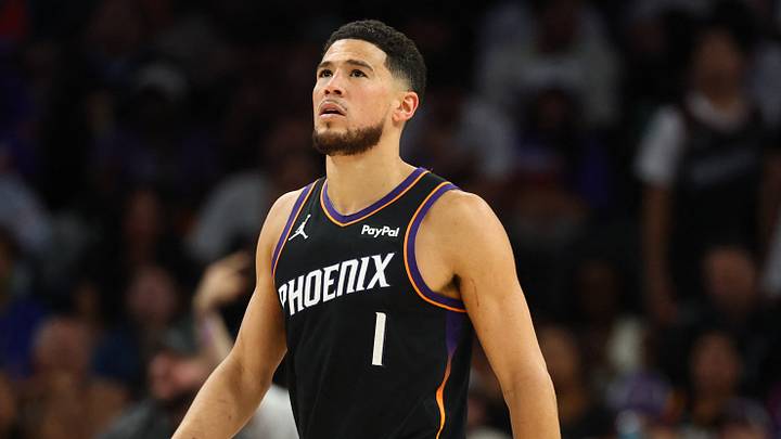 Apr 27, 2026; Phoenix, Arizona, USA; Phoenix Suns guard Devin Booker (1) reacts against Oklahoma City Thunder guard Shai Gilgeous-Alexander (2) in the second half during game four of the first round of the 2026 NBA Playoffs at Mortgage Matchup Center. Mandatory Credit: Mark J. Rebilas-Imagn Images Apr 27, 2026; Phoenix, Arizona, USA; Phoenix Suns guard Devin Booker (1) reacts against Oklahoma City Thunder guard Shai Gilgeous-Alexander (2) in the second half during game four of the first round of the 2026 NBA Playoffs at Mortgage Matchup Center. Mandatory Credit: Mark J. Rebilas-Imagn Images