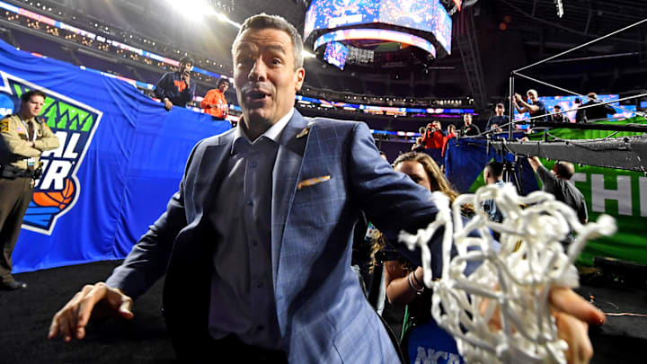 Apr 8, 2019; Minneapolis, MN, USA; Virginia Cavaliers head coach Tony Bennett celebrates with fans after beating the Texas Tech Red Raiders in the championship game of the 2019 men's Final Four at US Bank Stadium. 