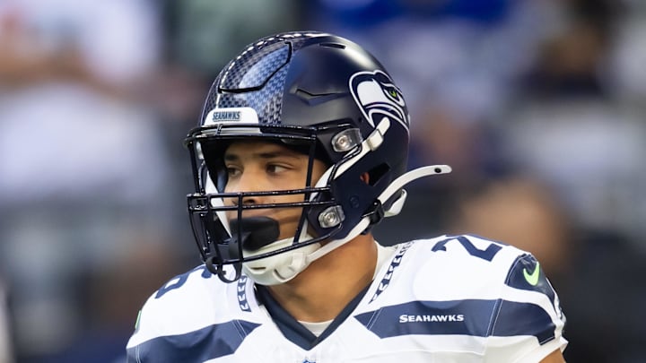 Seattle Seahawks running back Zach Charbonnet runs onto the field Seattle Seahawks running back Zach Charbonnet runs onto the field