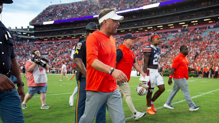 Auburn Tigers head coach Hugh Freeze walks off the field after watching his team waste a golden opportunity to beat the Oklahoma Sooners.