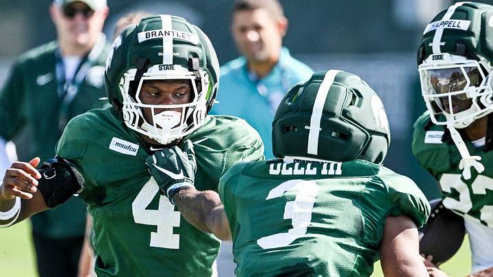 Michigan State defensive backs Charles Brantley, left, and Tre Bell III run a drill during football practice on Monday, Aug. 17, 2026, in East Lansing. Michigan State defensive backs Charles Brantley, left, and Tre Bell III run a drill during football practice on Monday, Aug. 17, 2026, in East Lansing.