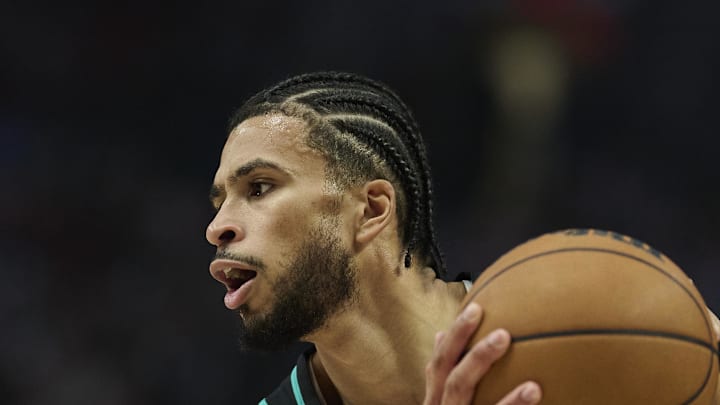 Portland Trail Blazers forward Toumani Camara controls the ball during the first half
