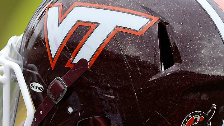 Nov 28, 2015; Charlottesville, Va.; Virginia Tech players wear a helmet decal. Nov 28, 2015; Charlottesville, Va.; Virginia Tech players wear a helmet decal.