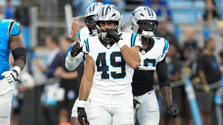 Aug 2, 2025; Charlottle, NC, USA; Carolina Panthers linebacker Jon Rhattigan (49) during Fanfest at Bank of America Stadium. Mandatory Credit: Jim Dedmon-Imagn Images Aug 2, 2025; Charlottle, NC, USA; Carolina Panthers linebacker Jon Rhattigan (49) during Fanfest at Bank of America Stadium. Mandatory Credit: Jim Dedmon-Imagn Images
