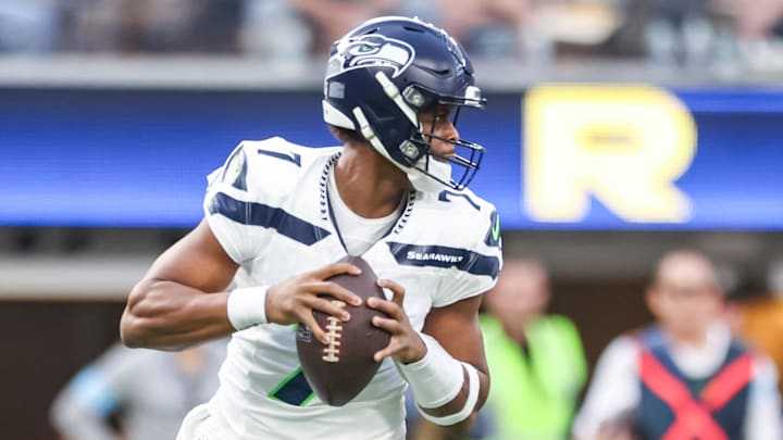 Jan 5, 2025; Inglewood, California, USA; Seattle Seahawks Geno Smith (7) in the pocket during the 1st quarter versus the Los Angeles Rams at SoFi Stadium. Mandatory Credit: William Navarro-Imagn Images