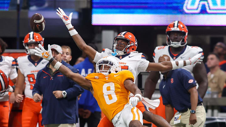 Aug 30, 2025; Atlanta, Georgia, USA; Tennessee Volunteers defensive back Colton Hood (8) breaks up a pass intended for Syracuse Orange wide receiver Darrell Gill Jr. (15) in the fourth quarter at Mercedes-Benz Stadium. Mandatory Credit: Brett Davis-Imagn Images
