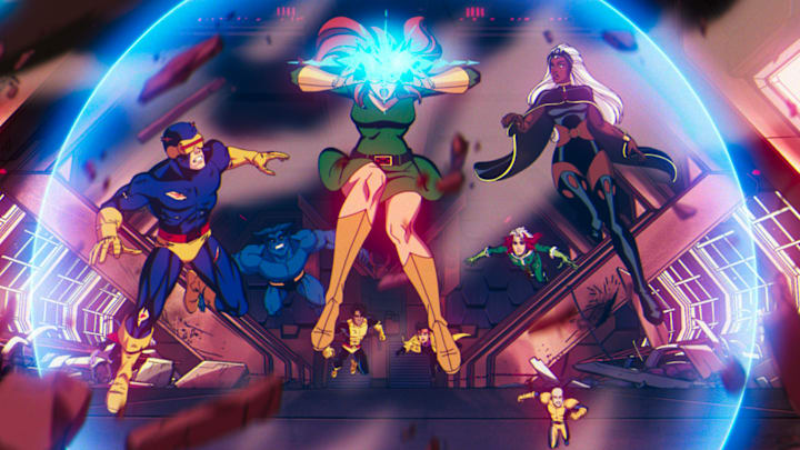 (L-R): Cyclops (voiced by Ray Chase), Beast (voiced by George Buza), Jean Grey (voiced by Jennifer Hale), Roberto Da Costa (voiced by Gui Agustini), Jubilee (voiced by Holly Chou), Morph (voiced by JP Karliak), and Storm (voiced by Alison Sealy-Smith) in Marvel Animation's X-MEN '97. Photo courtesy of Marvel Animation. © 2024 MARVEL. (L-R): Cyclops (voiced by Ray Chase), Beast (voiced by George Buza), Jean Grey (voiced by Jennifer Hale), Roberto Da Costa (voiced by Gui Agustini), Jubilee (voiced by Holly Chou), Morph (voiced by JP Karliak), and Storm (voiced by Alison Sealy-Smith) in Marvel Animation's X-MEN '97. Photo courtesy of Marvel Animation. © 2024 MARVEL.