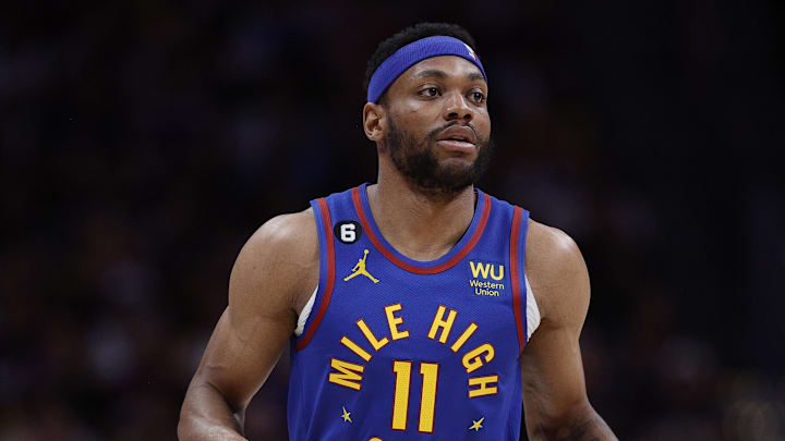 May 16, 2023; Denver, Colorado, USA; Denver Nuggets forward Bruce Brown (11) controls the ball against the Los Angeles Lakers in the first quarter during game one of the Western Conference Finals for the 2023 NBA playoffs at Ball Arena. Mandatory Credit: Isaiah J. Downing-Imagn Images