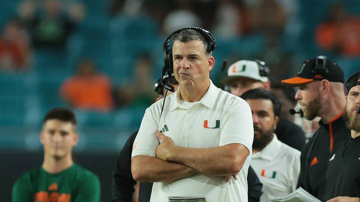 Sep 10, 2026; Miami Gardens, Florida, USA; Miami Hurricanes head coach Mario Cristobal looks on in the fourth quarter against the Florida A&M Rattlers at Hard Rock Stadium. Mandatory Credit: Sam Navarro-Imagn Images Sep 10, 2026; Miami Gardens, Florida, USA; Miami Hurricanes head coach Mario Cristobal looks on in the fourth quarter against the Florida A&M Rattlers at Hard Rock Stadium. Mandatory Credit: Sam Navarro-Imagn Images