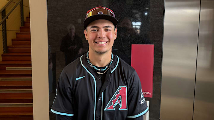 Arizona Diamondbacks infield prospect Demetrio Crisantes poses for a picture prior to the Spring Breakout game against the Kansas City Royals prospect at Salt River Fields, March 14, 2025