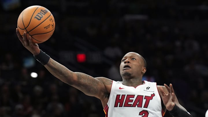 Nov 6, 2024; Phoenix, Arizona, USA; Miami Heat guard Terry Rozier (2) goes up for a layup against the Phoenix Suns during the second half at Footprint Center. Mandatory Credit: Joe Camporeale-Imagn Images