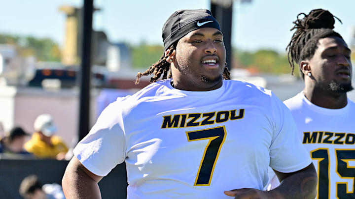 Oct 12, 2024; Amherst, Massachusetts, USA; Missouri Tigers defensive tackle Chris McClellan (7) warms up before a game against the Massachusetts Minutemen at Warren McGuirk Alumni Stadium. Mandatory Credit: Eric Canha-Imagn Images