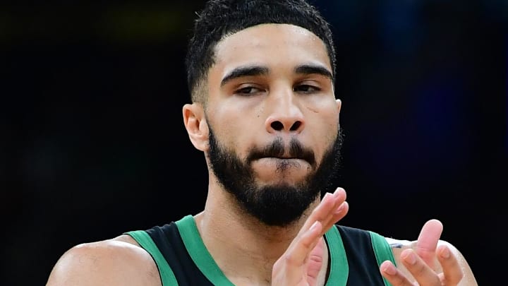 Apr 2, 2025; Boston, Massachusetts, USA; Boston Celtics forward Jayson Tatum (0) reacts after a play during the first half against the Miami Heat at TD Garden. Mandatory Credit: Bob DeChiara-Imagn Images Apr 2, 2025; Boston, Massachusetts, USA; Boston Celtics forward Jayson Tatum (0) reacts after a play during the first half against the Miami Heat at TD Garden. Mandatory Credit: Bob DeChiara-Imagn Images