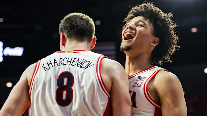 Dec 29, 2025; Tucson, Arizona, USA; Arizona Wildcats forward Ivan Kharchenkov (8) celebrates with guard Brayden Burries (5) during the second half of the game against the South Dakota State Jackrabbits at McKale Memorial Center. Mandatory Credit: Aryanna Frank-Imagn Images