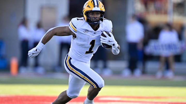 Nov 30, 2024; Dallas, Texas, USA; California Golden Bears running back Jaydn Ott (1) in action during the game between the SMU Mustangs and the California Golden Bears at Gerald J. Ford Stadium. Mandatory Credit: Jerome Miron-Imagn Images