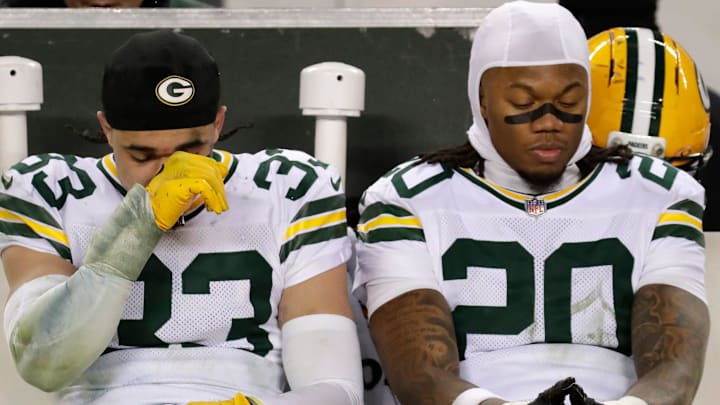 Green Bay Packers safety Evan Williams (33) and safety Javon Bullard (20) react to a loss to the Chicago Bears.