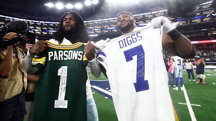 Green Bay Packers defensive end Micah Parsons and Dallas Cowboys cornerback Trevon Diggs exchange jerseys after the game